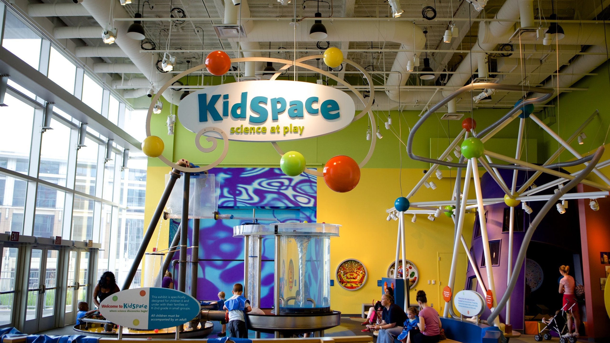 Connecticut Science Center featuring a playground and interior views as well as children