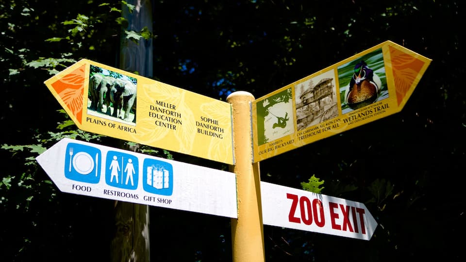Roger Williams Park Zoo showing signage and zoo animals