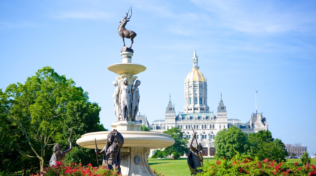 Bushnell Park which includes a statue or sculpture and a garden