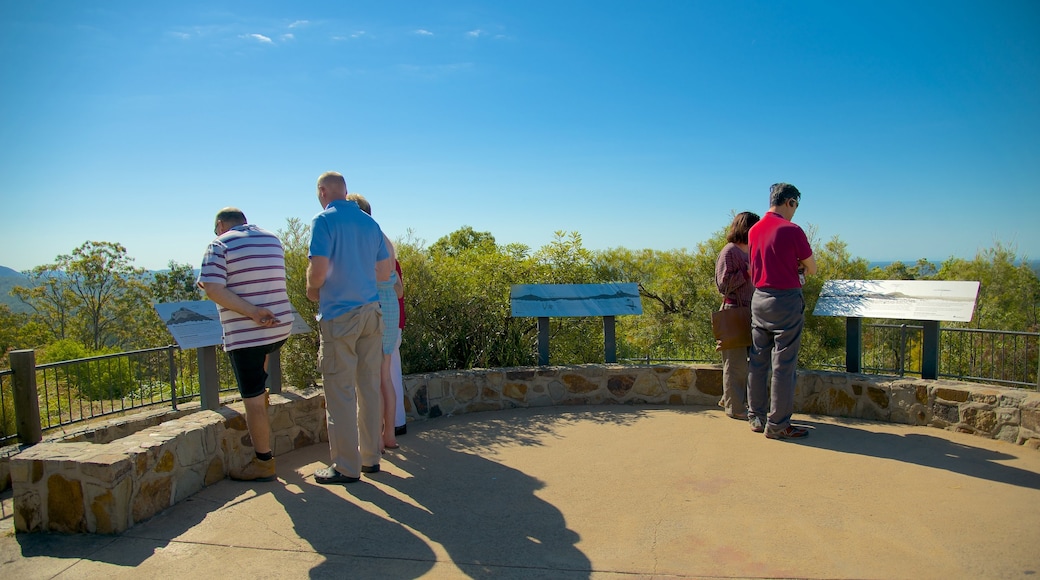 Glasshouse Mountains National Park showing views as well as a large group of people