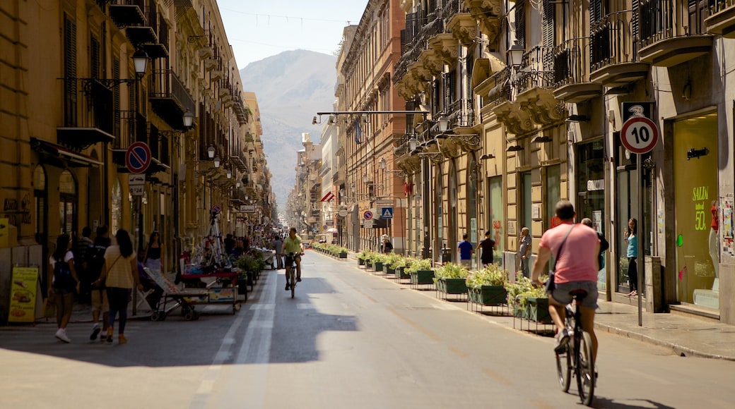 Via Maqueda which includes a small town or village, cycling and street scenes