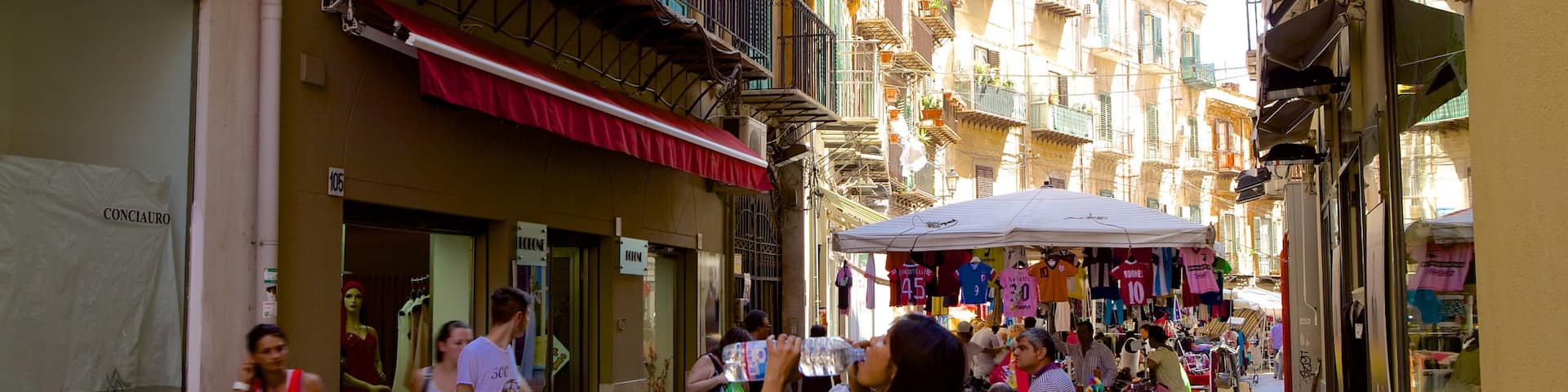 Via Maqueda which includes street scenes and markets as well as a large group of people