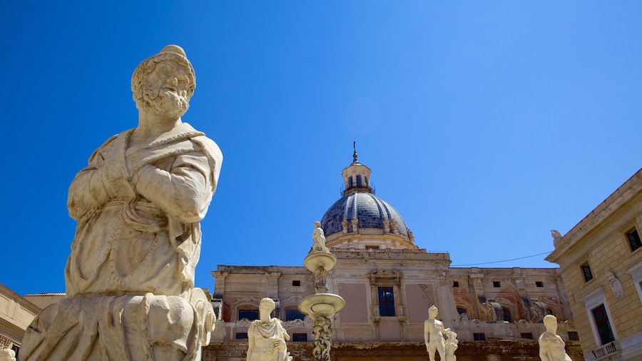 Via Maqueda mostrando elementos patrimoniales, una estatua o escultura y arquitectura patrimonial