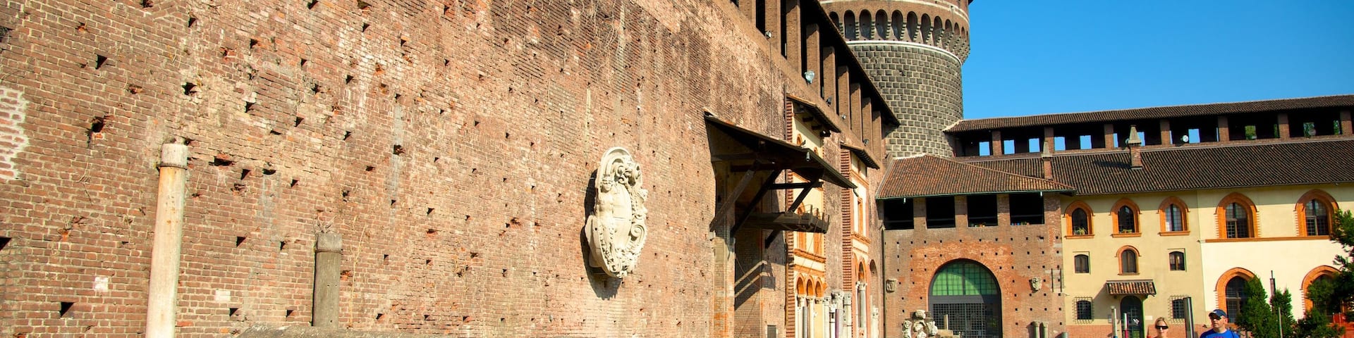 Castello Sforzesco showing heritage elements and chateau or palace as well as a small group of people