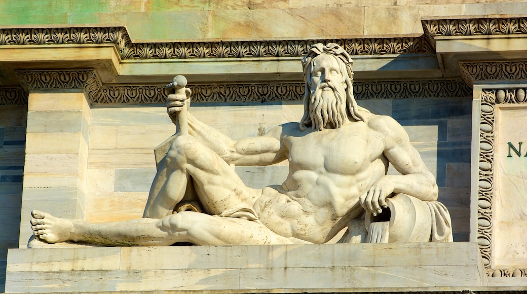 Arco della Pace featuring heritage elements and a statue or sculpture