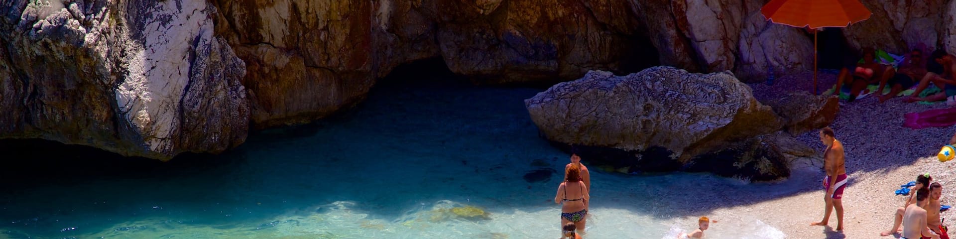 Zingaro Beach which includes swimming, a sandy beach and rugged coastline