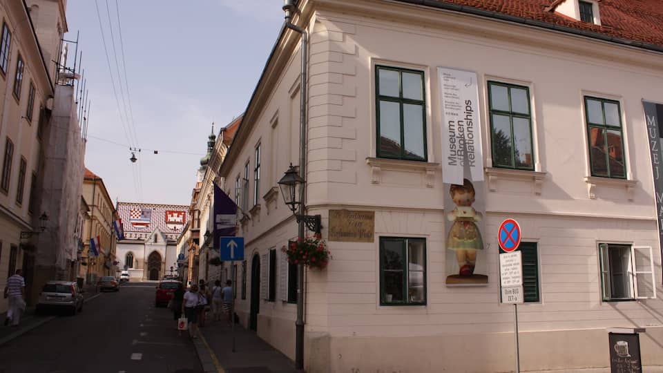 Museum of Broken Relationships which includes a small town or village and street scenes
