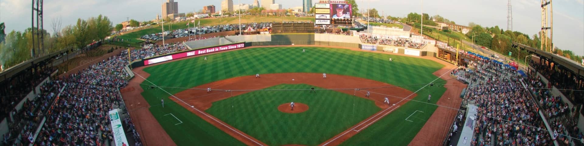 Winston - Salem showing a sporting event as well as a large group of people
