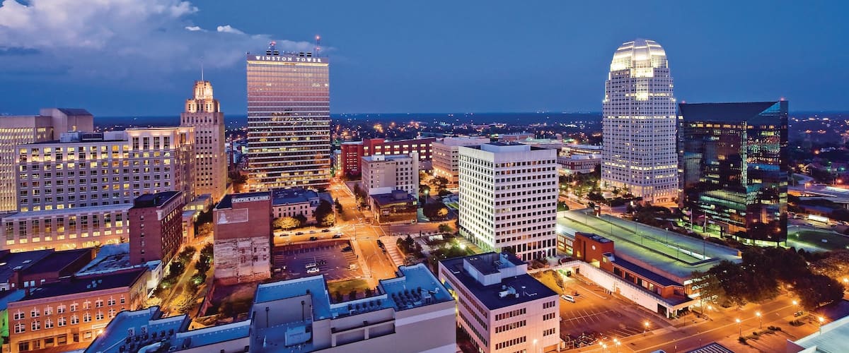 Winston - Salem featuring a city and night scenes