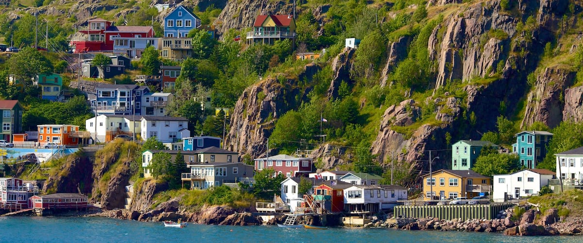 St. John\'s showing rugged coastline, general coastal views and a coastal town