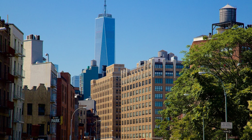 West Village showing a high-rise building and a city