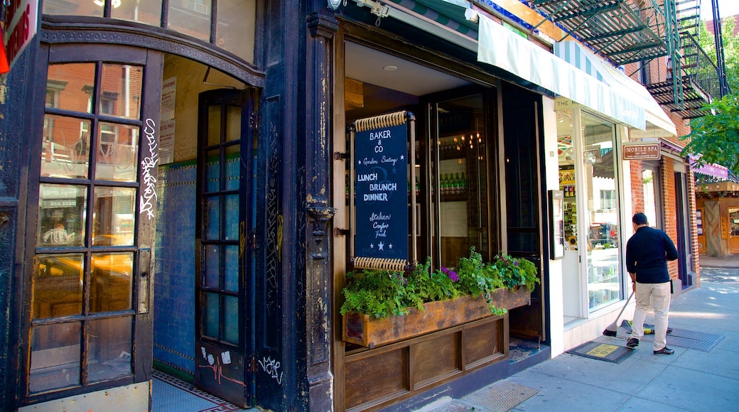 West Village toont cafés, een stad en centraal zakendistrict