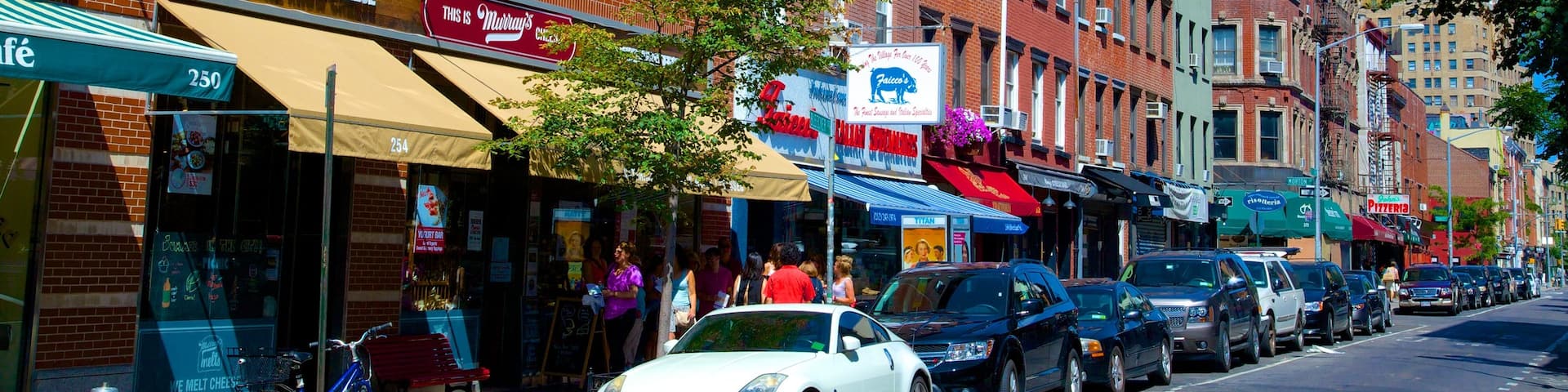 Bleecker Street showing a city and street scenes