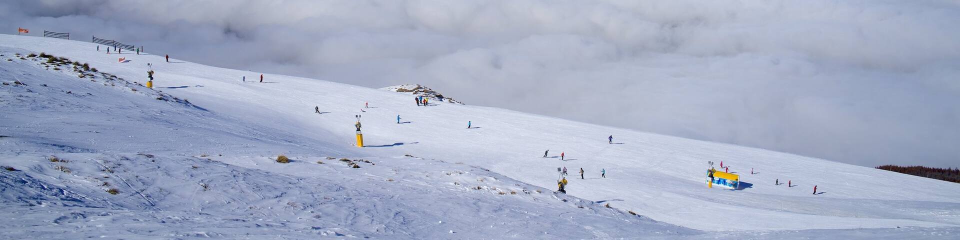 Coronet Peak Ski Area showing snow and mountains