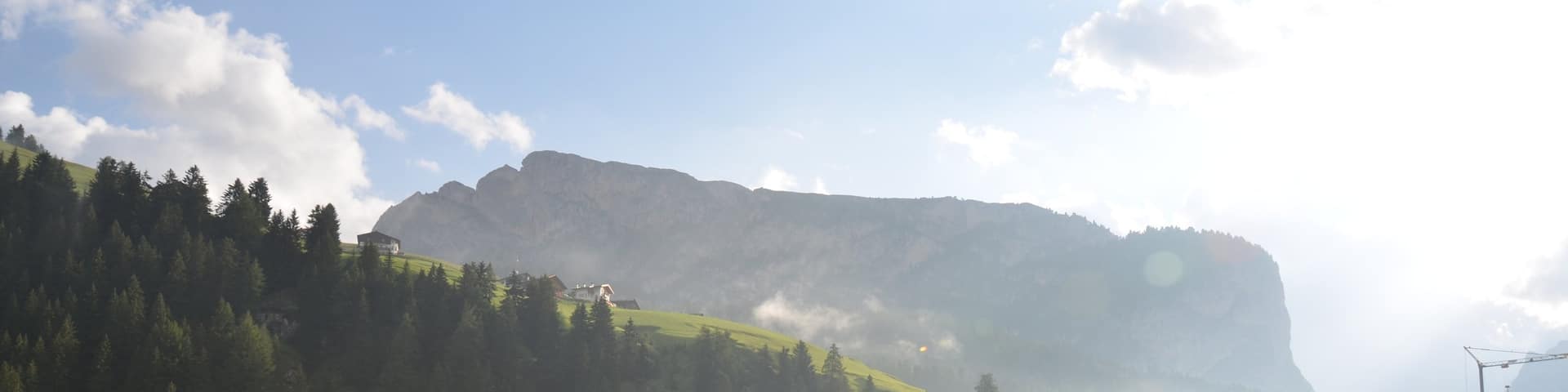 Ciampino-Sella Ski Area which includes tranquil scenes, mountains and a small town or village