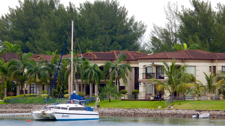 Richards Bay showing a bay or harbour and a house