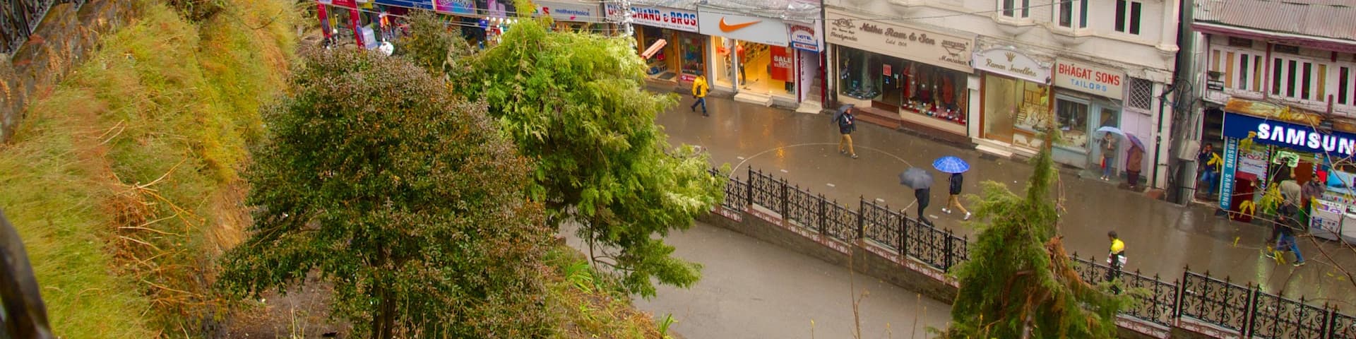 Shimla Mall showing mist or fog and a city