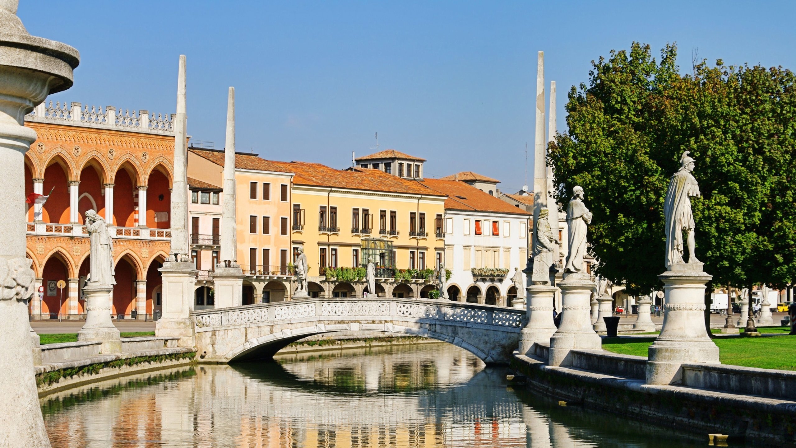 Padova which includes a bridge, heritage architecture and a river or creek