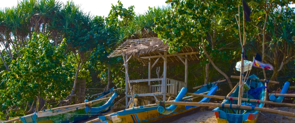 Central Java which includes a beach, tropical scenes and boating
