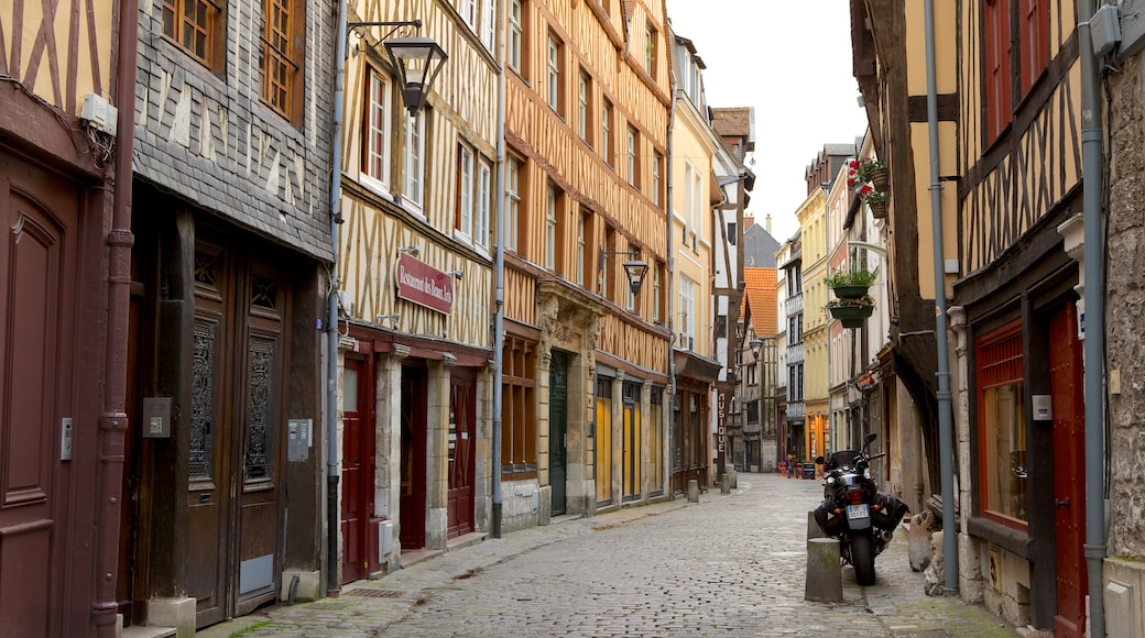 Rouen which includes heritage architecture and a small town or village