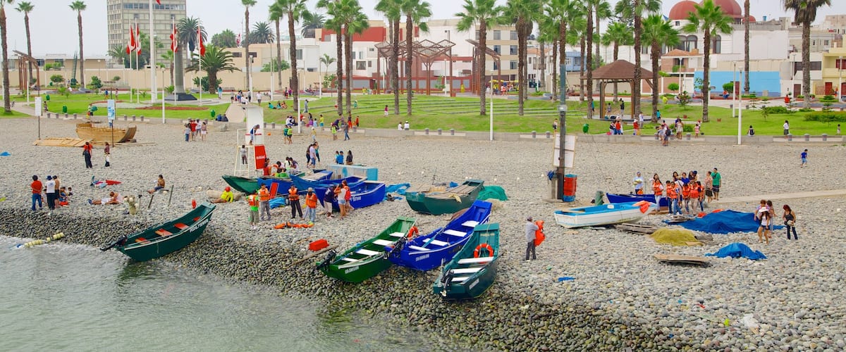 Punta Hermosa which includes kayaking or canoeing, a coastal town and boating
