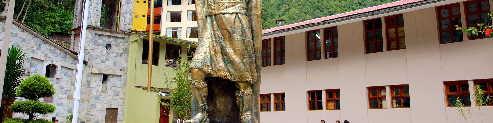 Cusco featuring a statue or sculpture and outdoor art