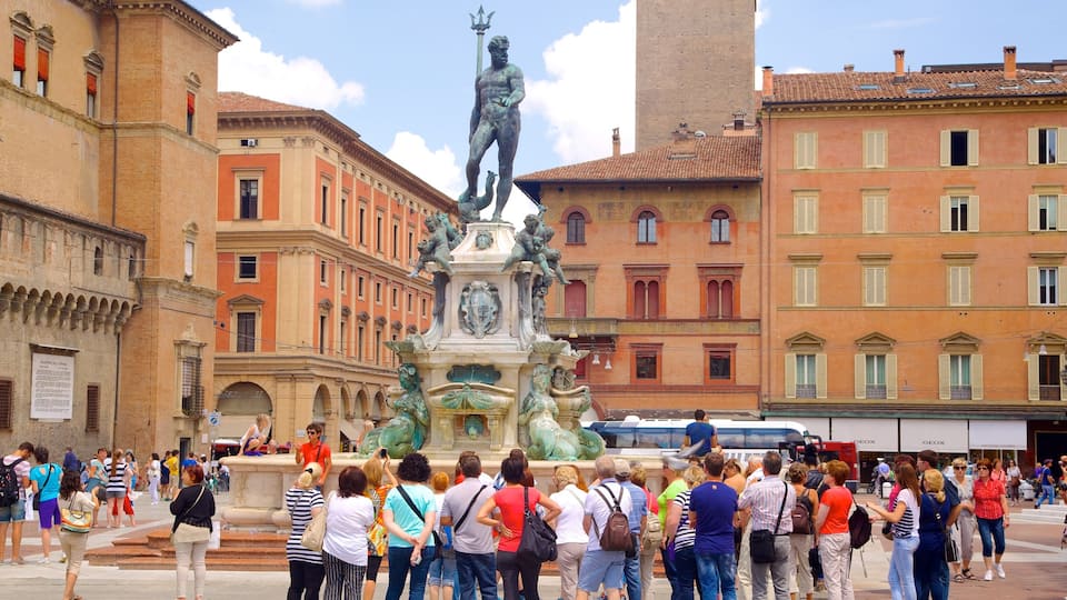 Fountain of Neptune featuring a statue or sculpture, heritage architecture and a fountain