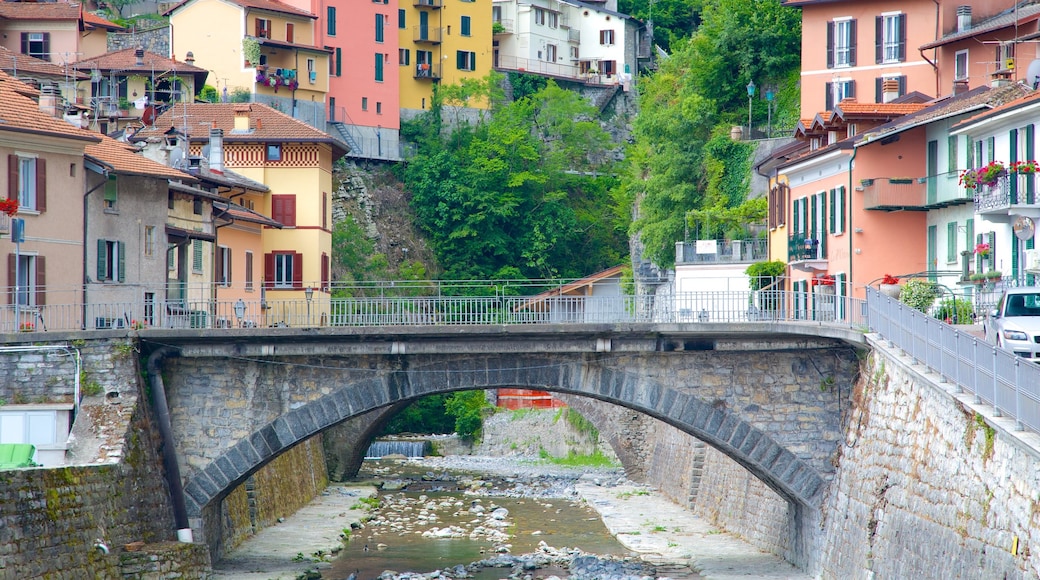 Argegno which includes a bridge, a small town or village and a river or creek