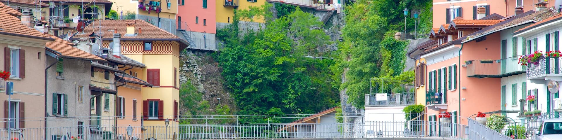 Argegno showing a river or creek, a small town or village and a bridge