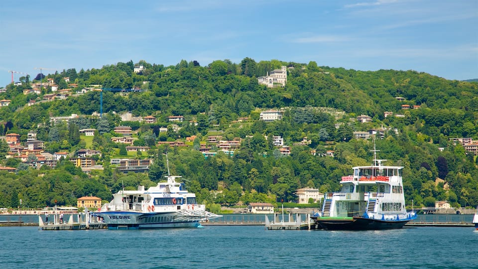 Piazza Cavour showing a ferry, a coastal town and a bay or harbor