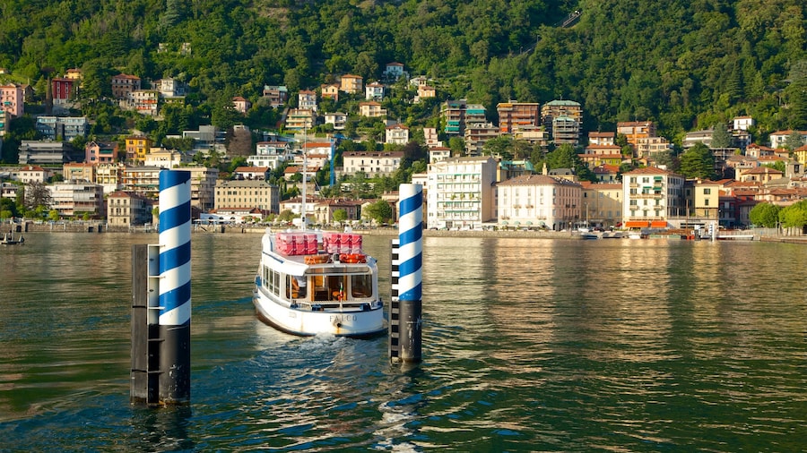 Piazza Cavour which includes a coastal town, a marina and a ferry