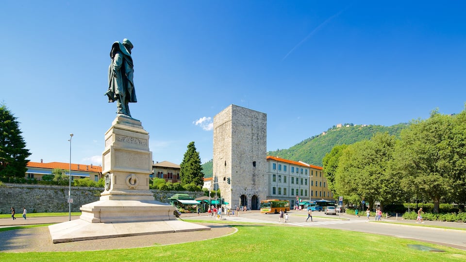 Piazza Vittoria which includes a square or plaza, a statue or sculpture and a monument