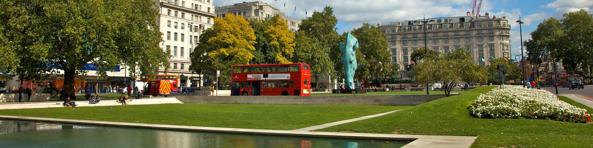 Hyde Park featuring a city, a garden and a pond