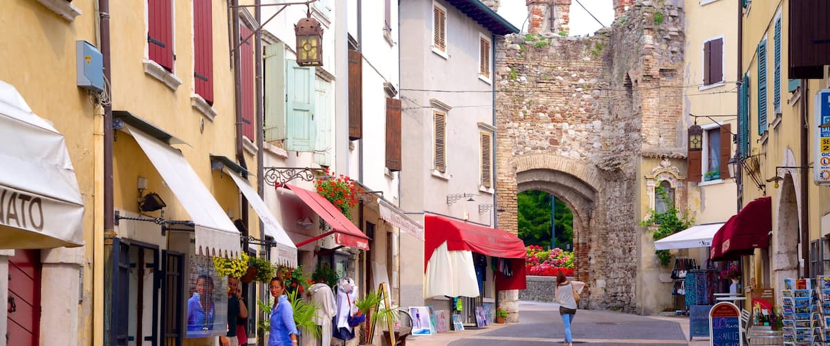 Lazise which includes a small town or village and street scenes
