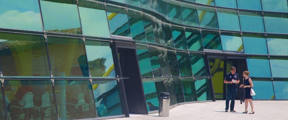 Museo Casa Enzo Ferrari which includes modern architecture as well as a couple