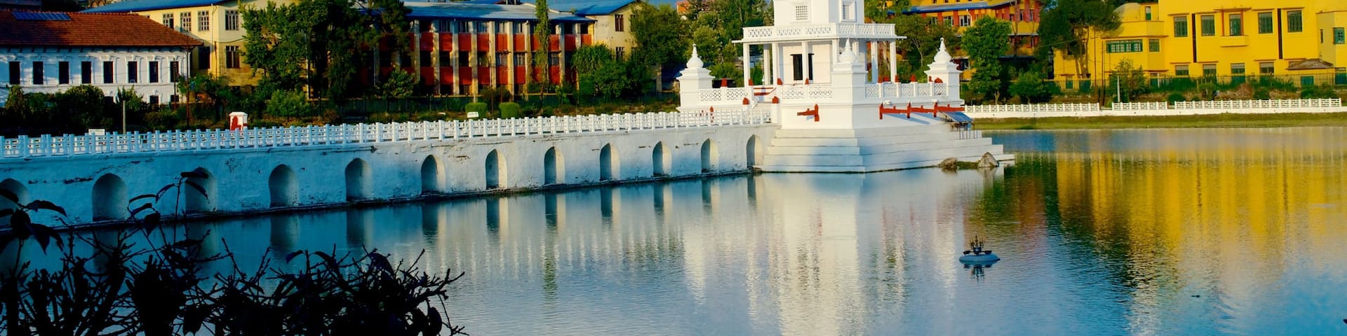 Kathmandu featuring a river or creek and a city