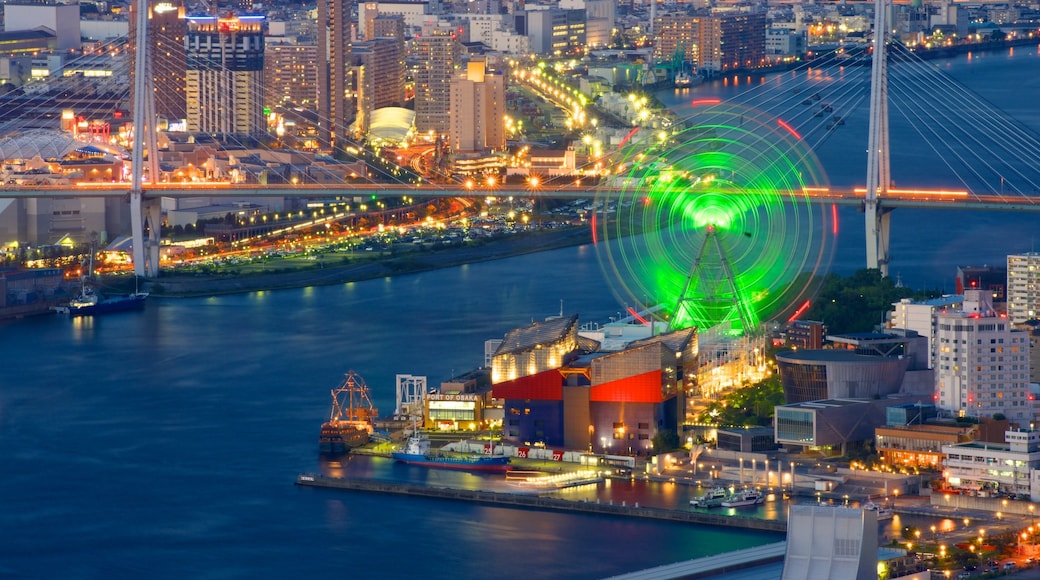 Osaka Prefectural Government Sakishima Building featuring night scenes, a city and a river or creek