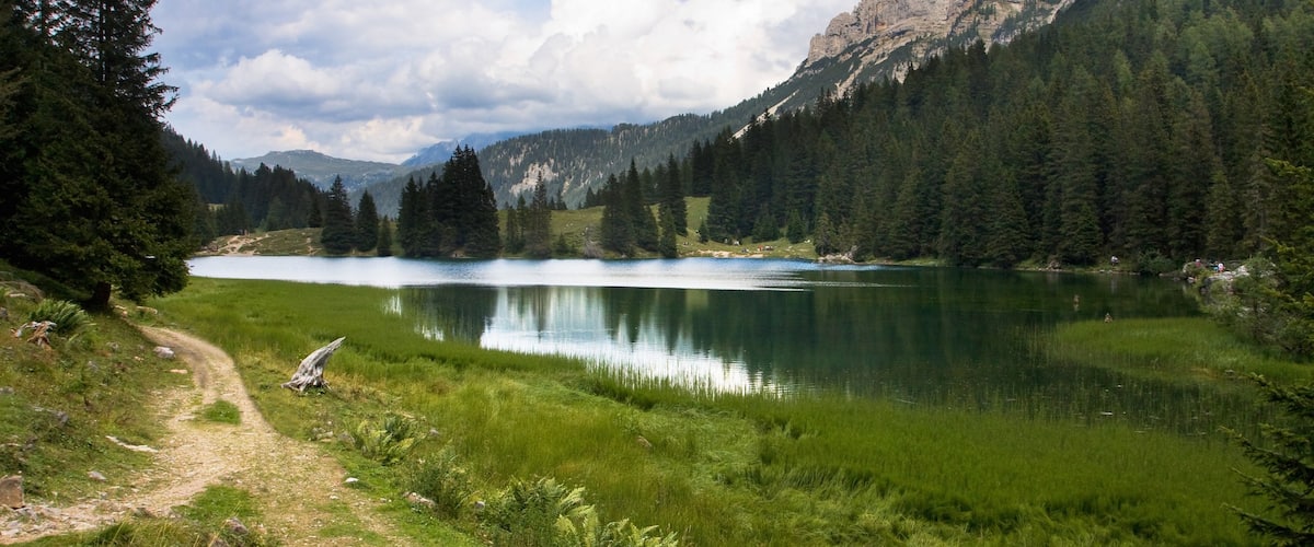 Madonna di Campiglio featuring tranquil scenes and a lake or waterhole
