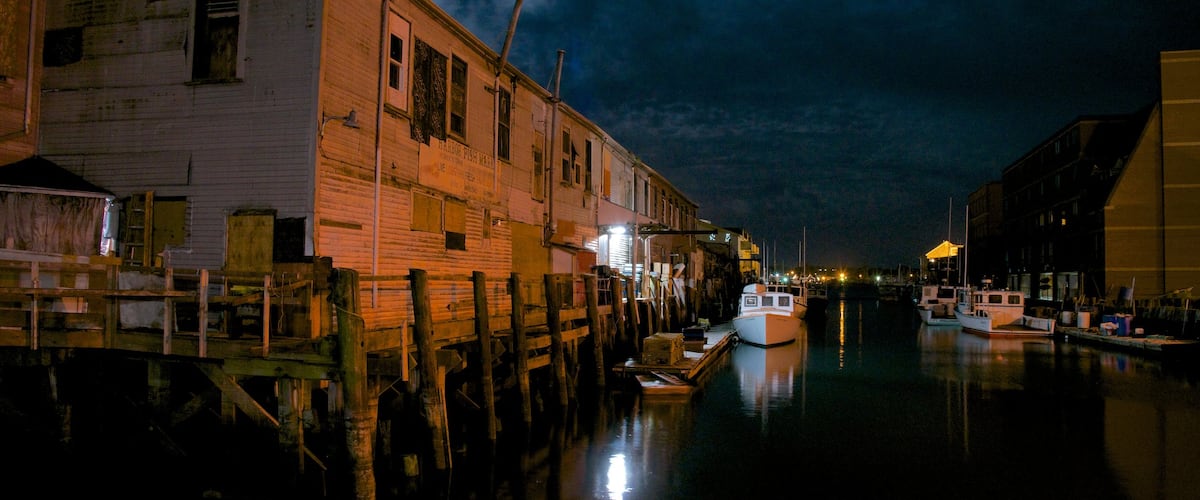 Portland showing night scenes, a bay or harbour and a city