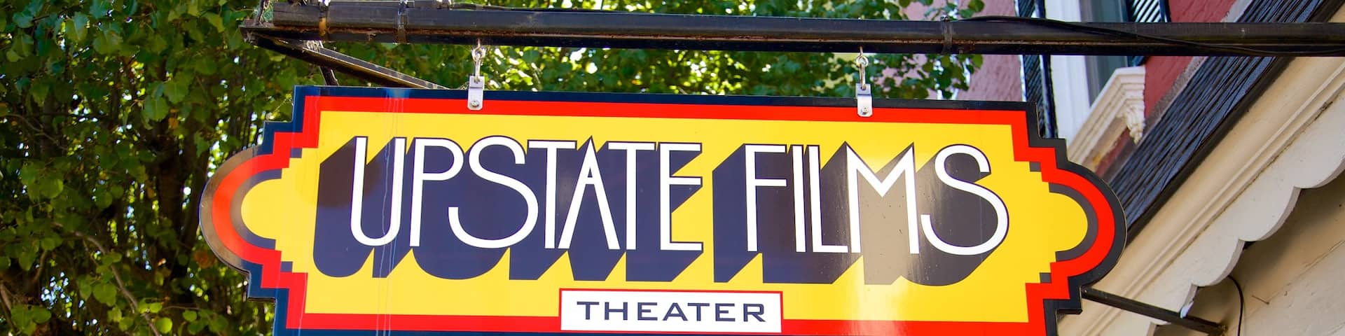 Rhinebeck showing signage and a city