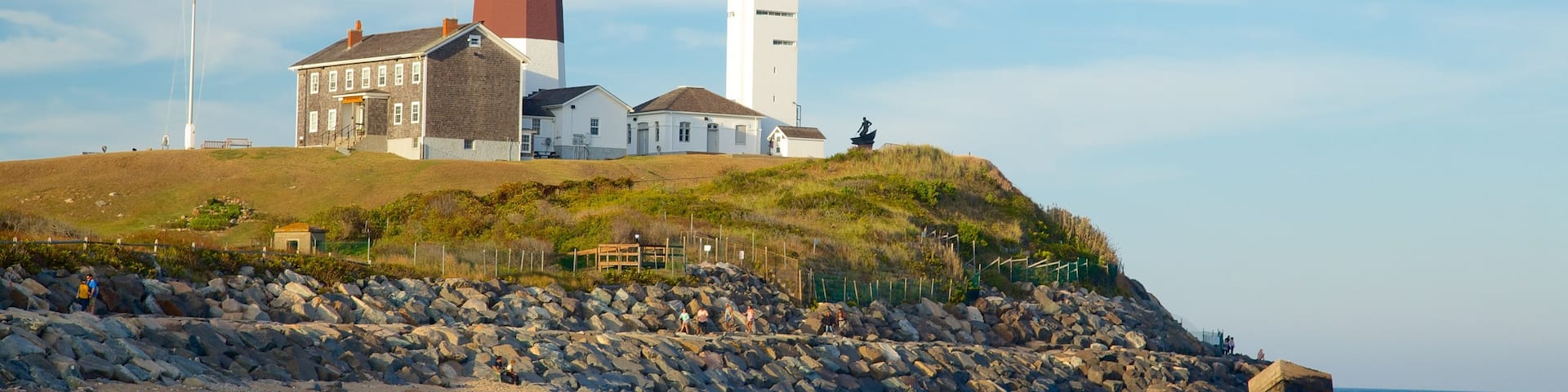 Montauk Point Lighthouse showing general coastal views, rocky coastline and a lighthouse
