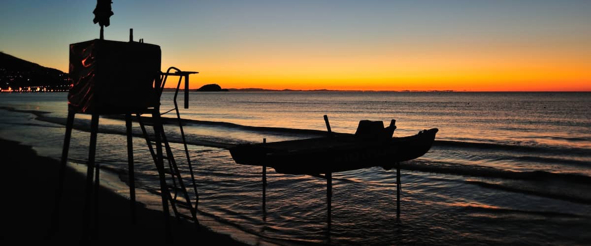 Alassio featuring general coastal views and a sunset