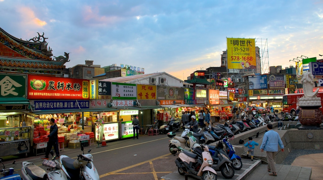 City God Temple showing a city and central business district