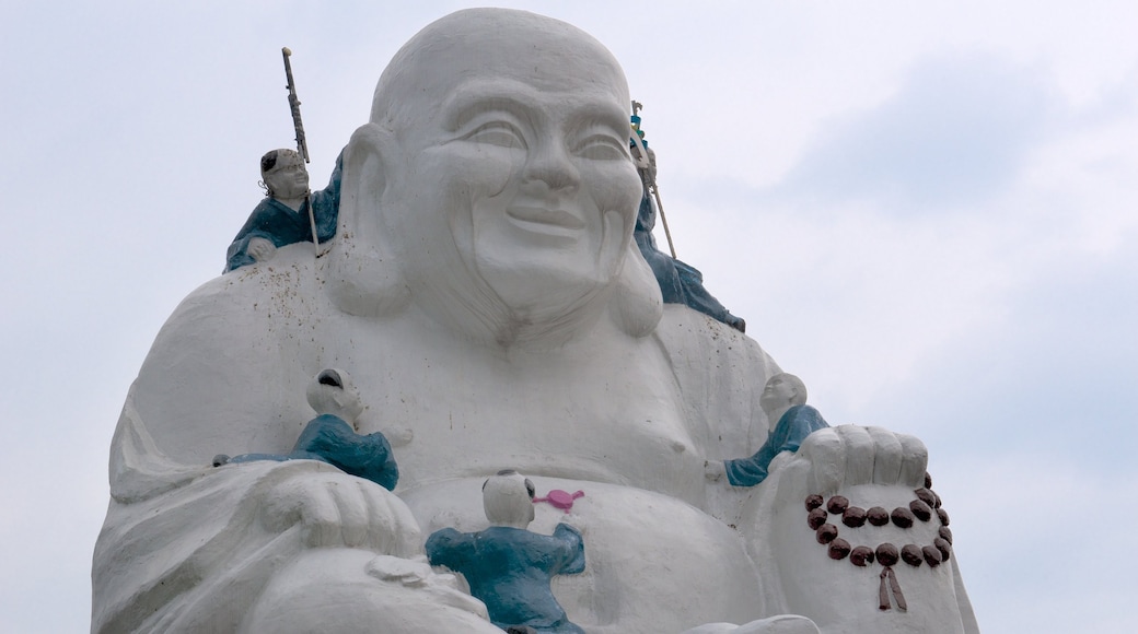 Statue of Guanyin showing religious elements and a statue or sculpture