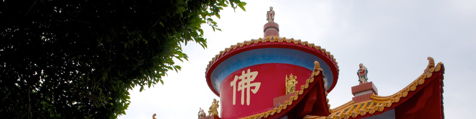 Statue of Guanyin featuring religious aspects and a temple or place of worship