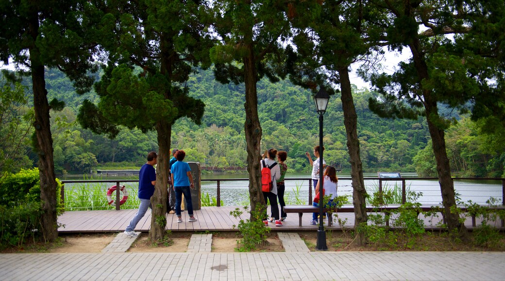 Cihu and Cihu Mausoleum featuring a park and a lake or waterhole