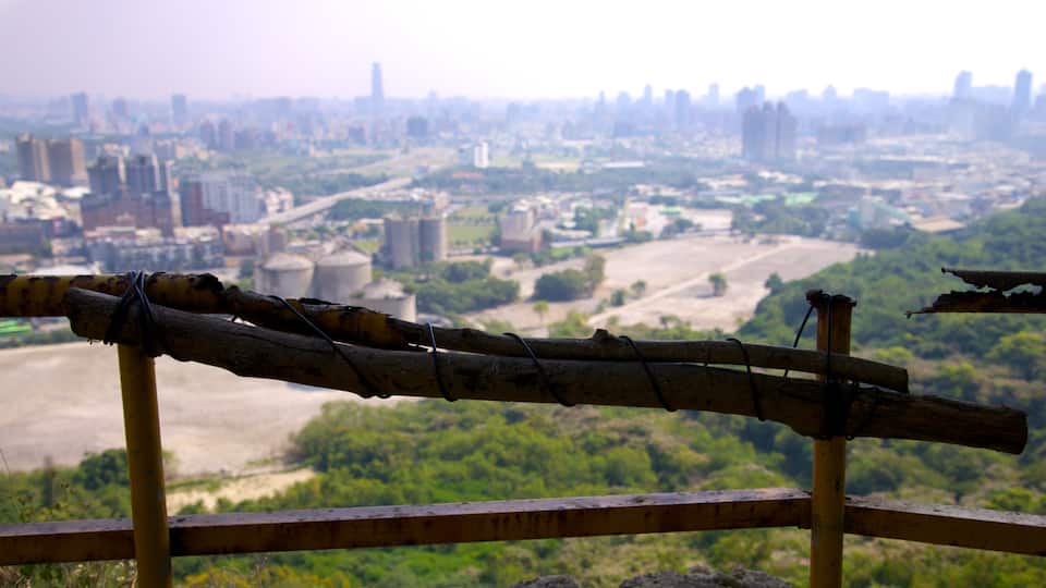Caishan Natural Park showing a city