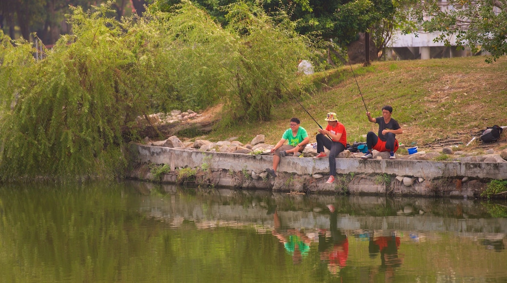 Kaohsiung Confucius Temple featuring a pond, a garden and fishing