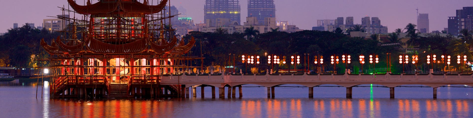 Spring and Autumn Pavillions featuring a sunset, a lake or waterhole and a temple or place of worship