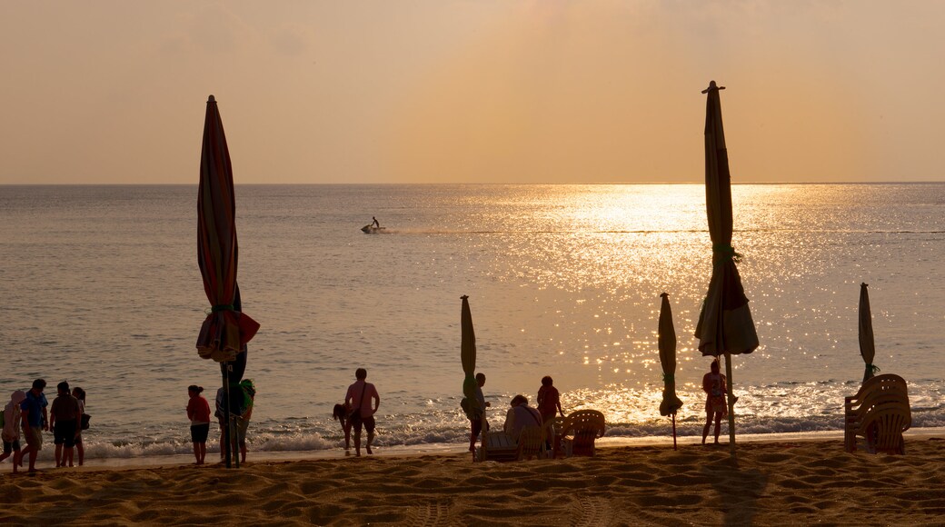 Kenting National Park showing a beach and a sunset